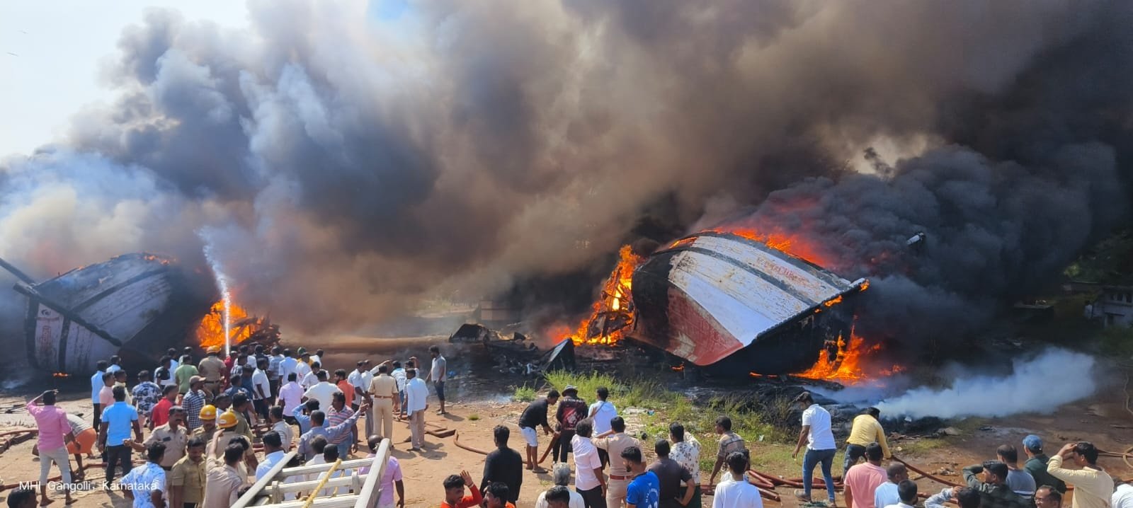 Fishing boats catch fire in Gangolli,Udupi District